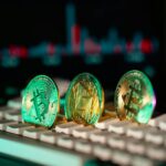 Turkey crypto license regulatory framework 2026 โ Bitcoin and Ethereum coins on keyboard with market charts, symbolizing legal compliance for crypto exchanges and digital assets